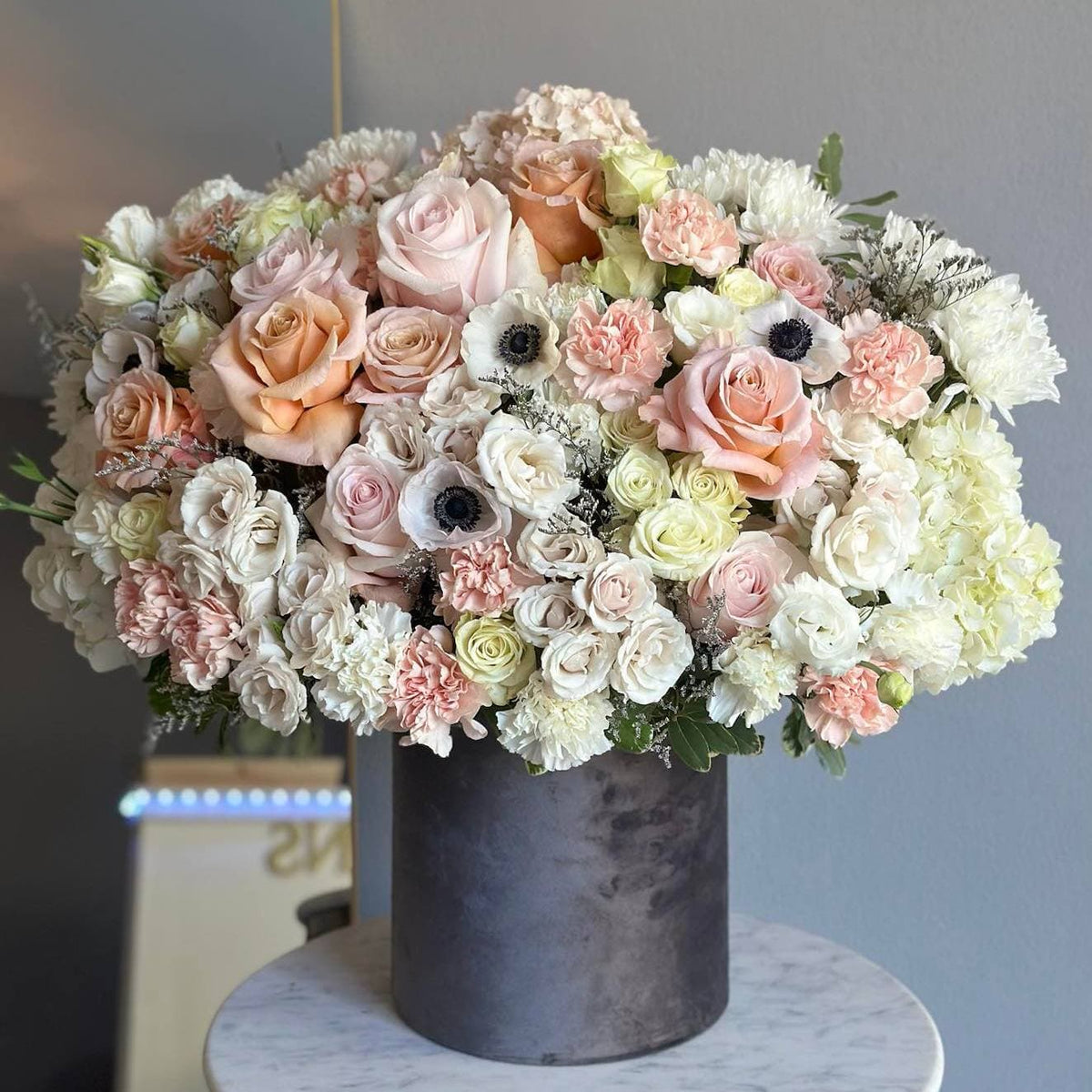 50 Shades of Flowers A Romantic Box Arrangement with Peach Roses